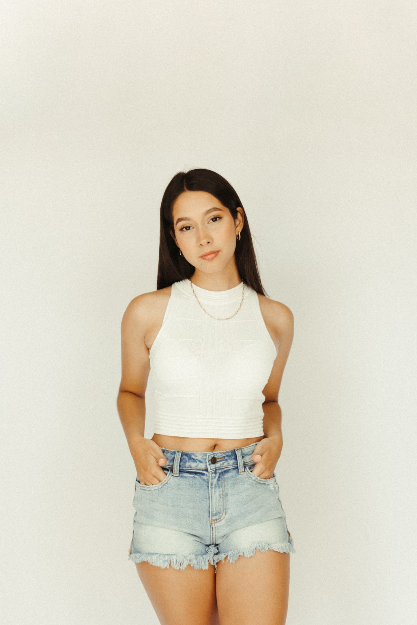 RIO DE JANEIRO – Distressed high-rise denim shorts